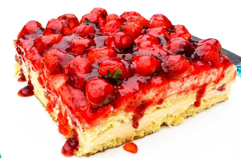 Fraisier.  A classic elegant French cake that is made of two layers of sponge cake sandwiched together with a mousseline cream