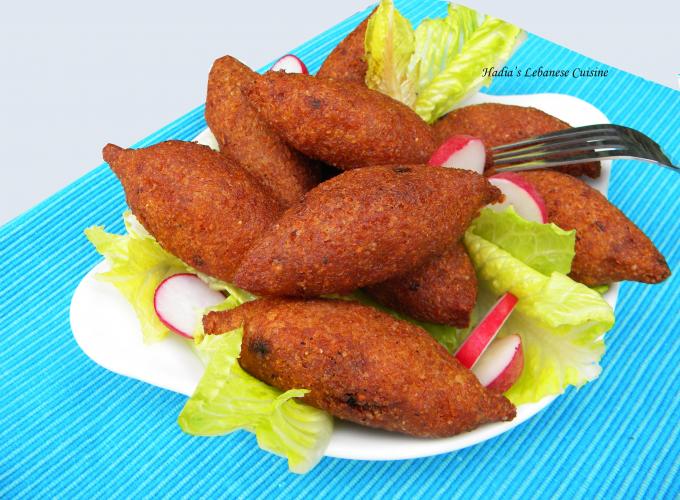Fried Potato Kibbeh Balls...The outer shell  is made with mashed potatoes and kneaded with fine bulgur.  The dough is stuffed with a filling of minced beef or lamb and walnuts, seasoned with sumac, allspice, cinnamon powder and chili flakes