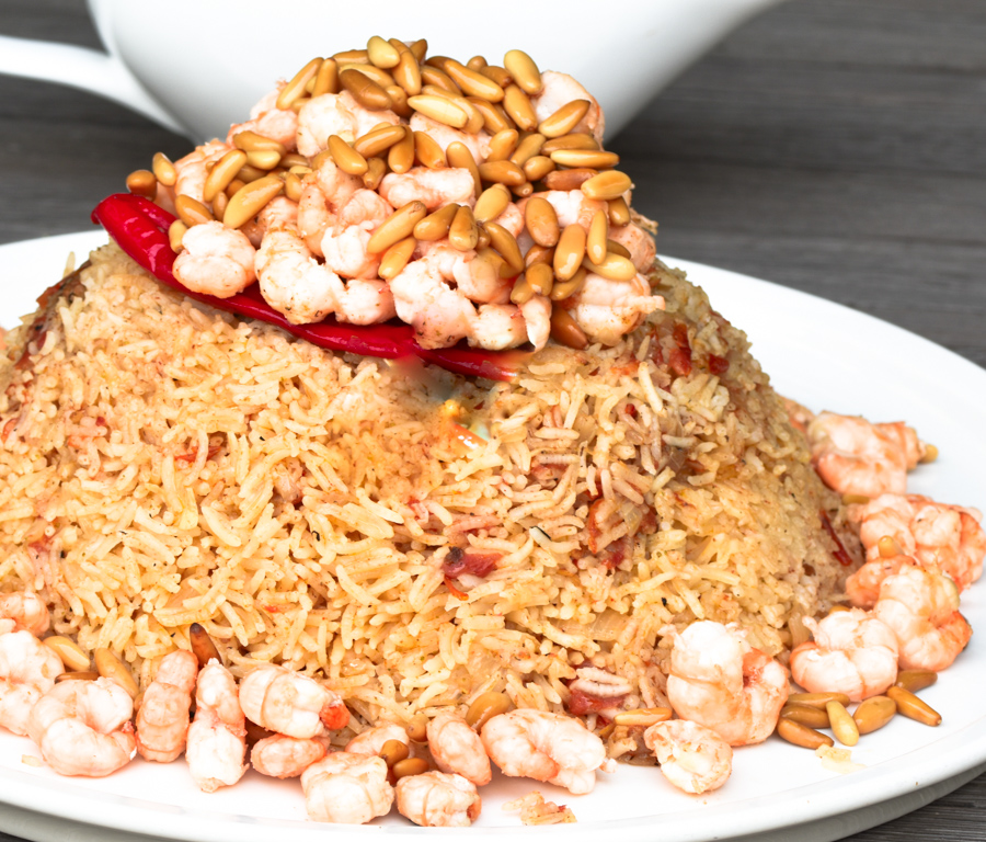 Shrimp Kabsa.    Kabsa is one of the most popular dishes in the Gulf region.  There are various methods to prepare this dish.  The following is an easy and very delicious recipe.